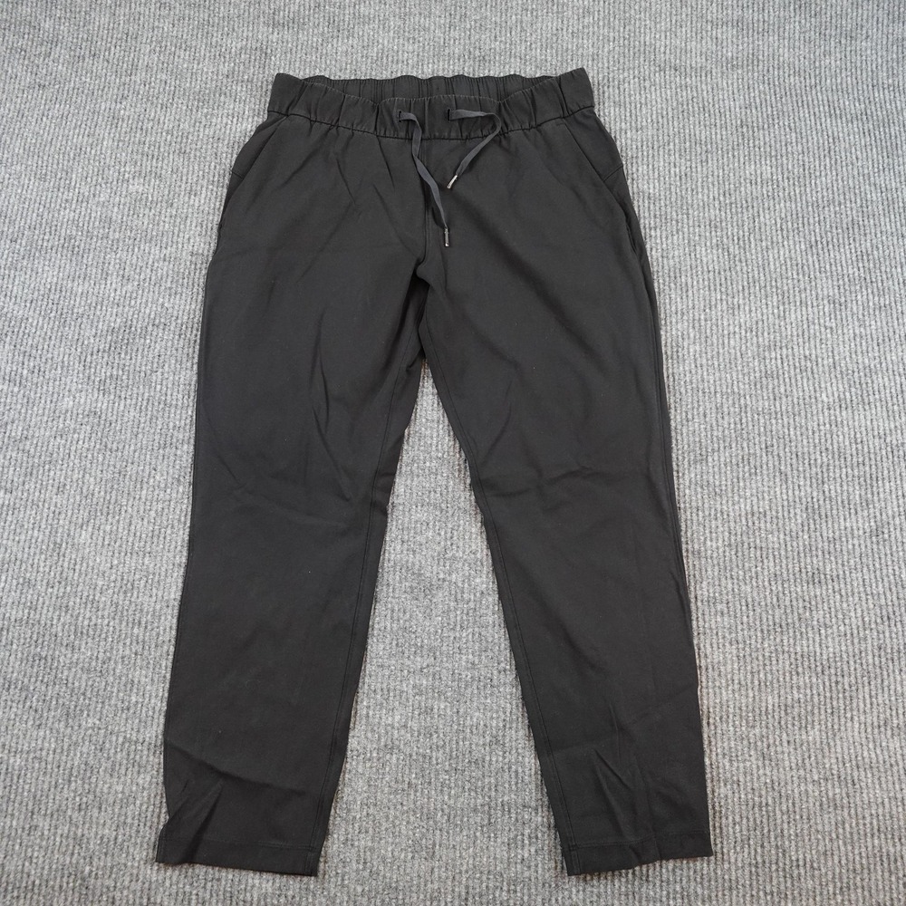 Lululemon On The Fly Pants Womens 10 Black Elastic Waist Pockets Yoga Gym
